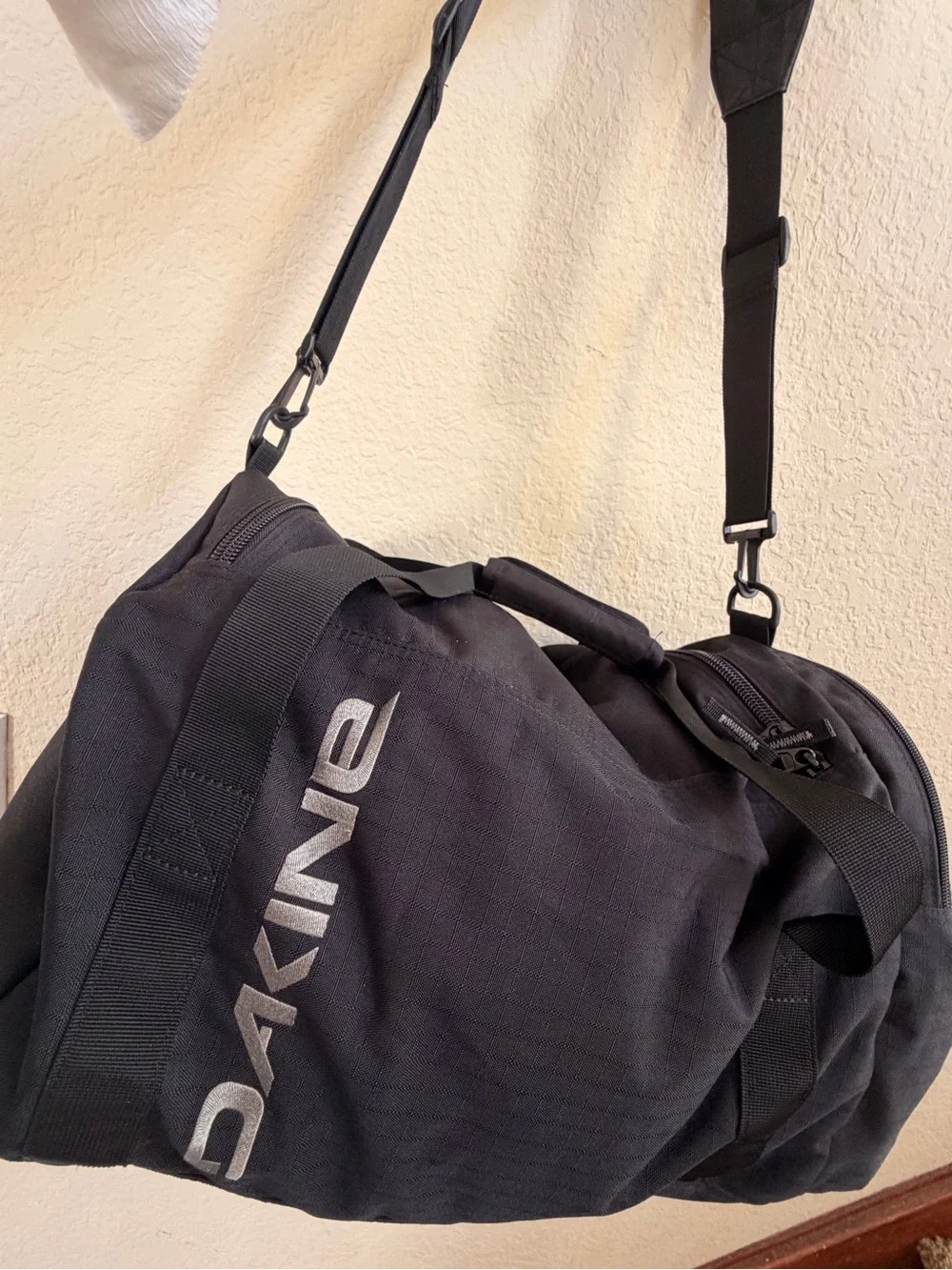 DAKINE Black Men’s Duffel with White Logo